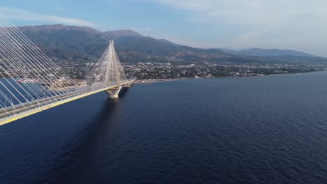 aerial shot of a suspended bridge. antirion, greece.