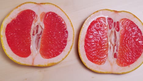 sliced ripe grapefruit rotation close-up