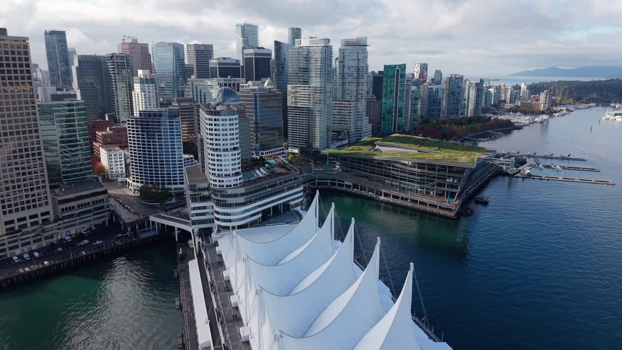 Aerial Push-In to Vancouver Convention Centre - framed by Canada Place and Stanley Park