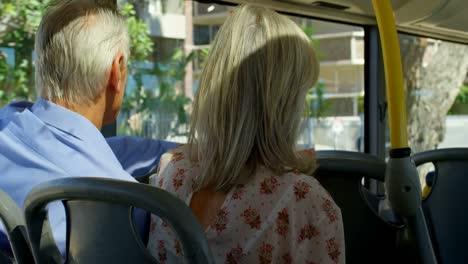 senior couple travelling in bus 4k
