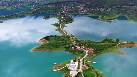 ripci township, rowing club and franciscan monastery in lake ramsko