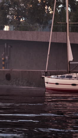 sailboat docked at a marina