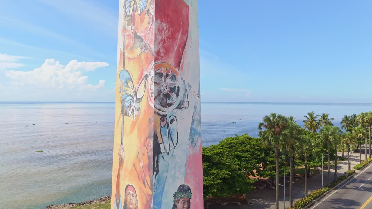 Obelisk of Santo Domingo in Dominican Republic, symbol of opposition to dictatorship. Aerial Pedestal-up and tilt-down