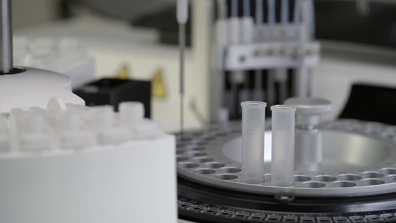 Close Up Of Sample Tray Of A Chemistry Analyzer With Two Sample Tubes