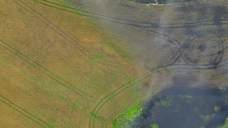 aerial view of farmland and water