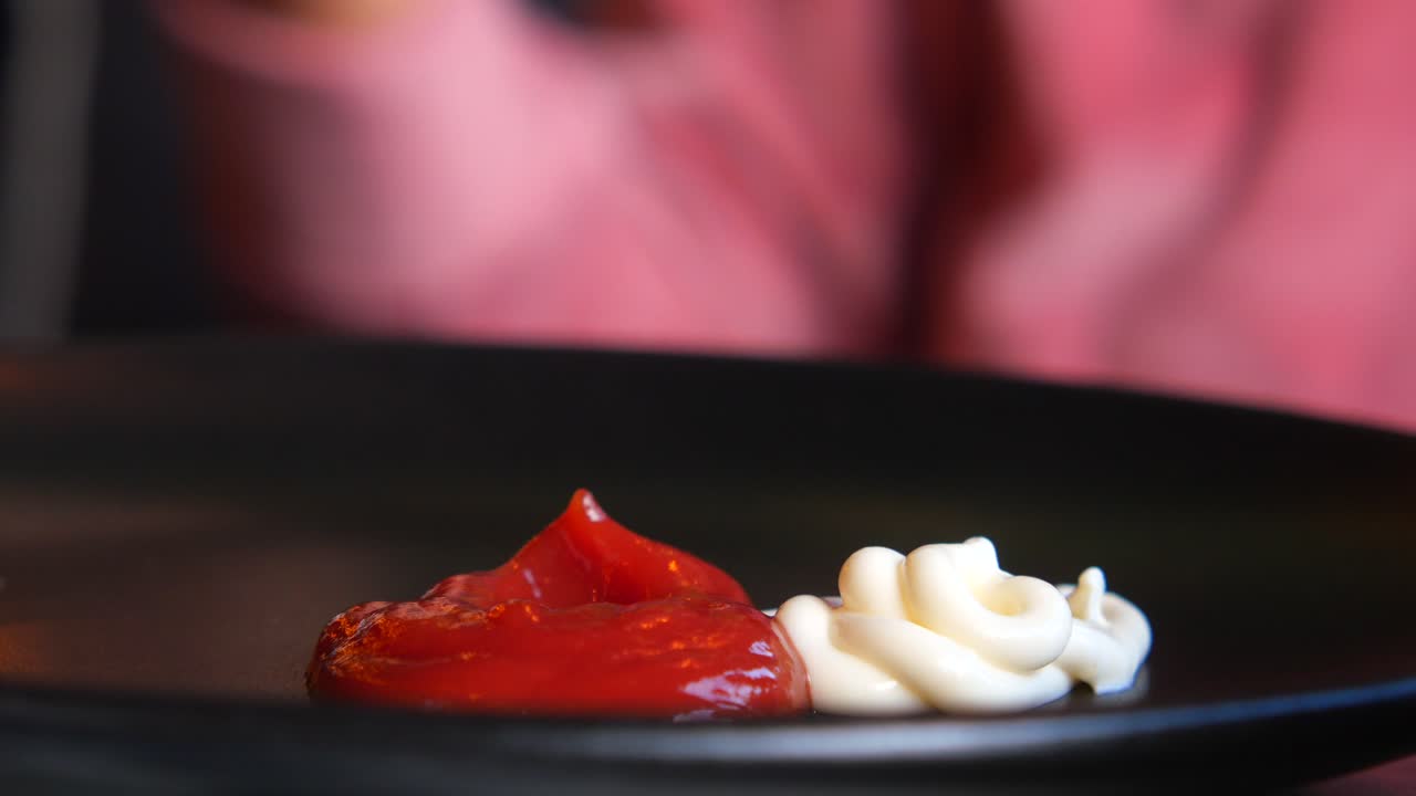 Ketchup and Mayonnaise on a Plate