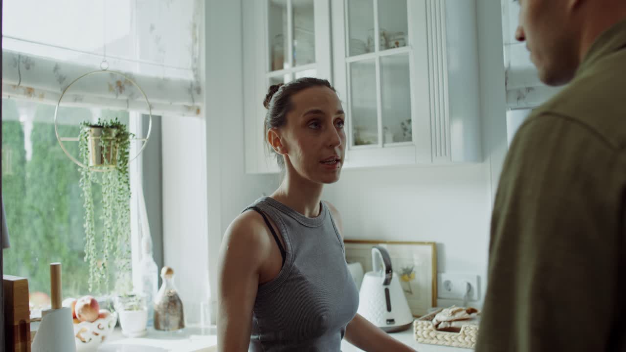 Couple Arguing in Kitchen