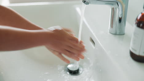 hygiene, closeup and girl washing her hands