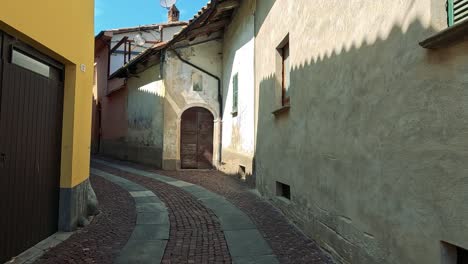 exploring narrow, colorful streets in cuneo, italy
