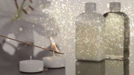 animación de puntos de luz sobre velas y cosméticos