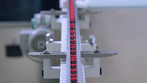 medicine bottles on pharmaceutical manufacturing line. automated production line