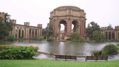 the palace of fine arts park and a lake in the middle