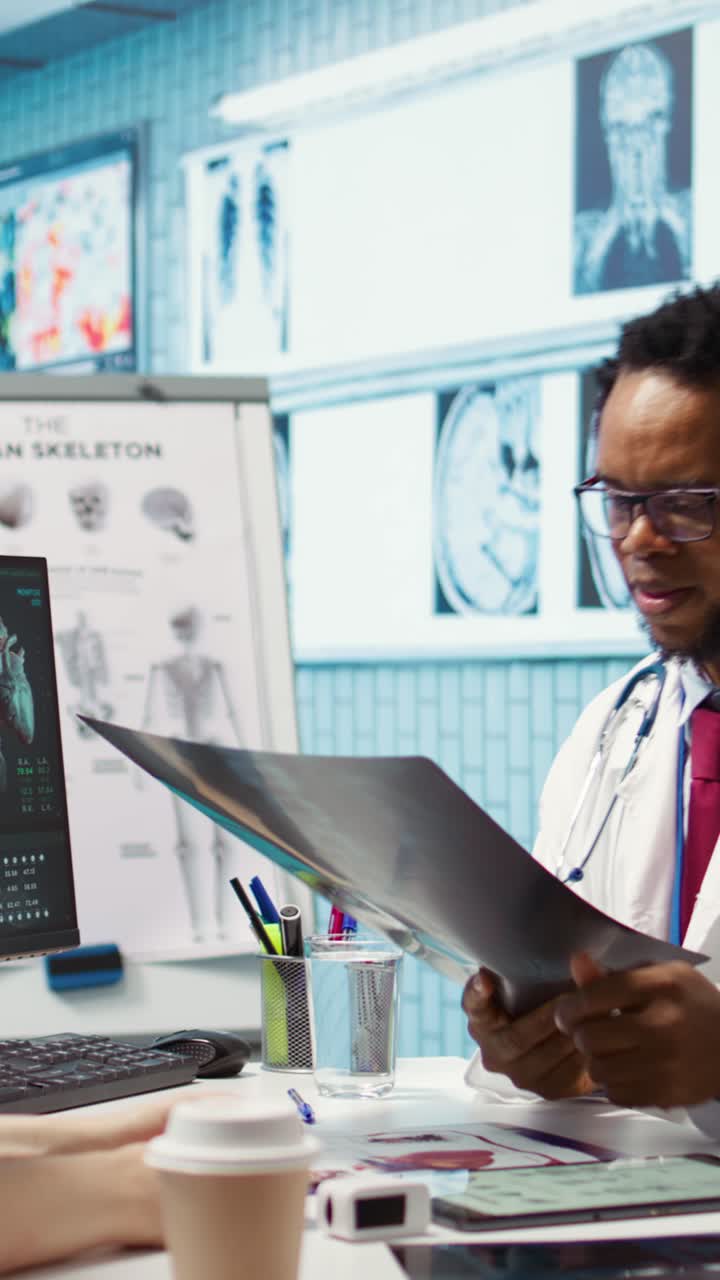 Medic expert showing the x ray imaging test results to patient at check up