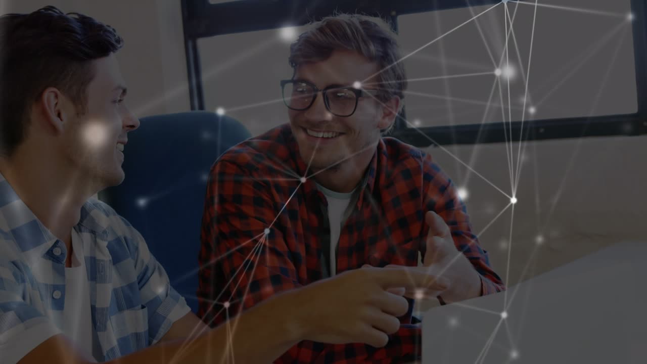 Animation of network of connections over happy caucasian male coworkers in office
