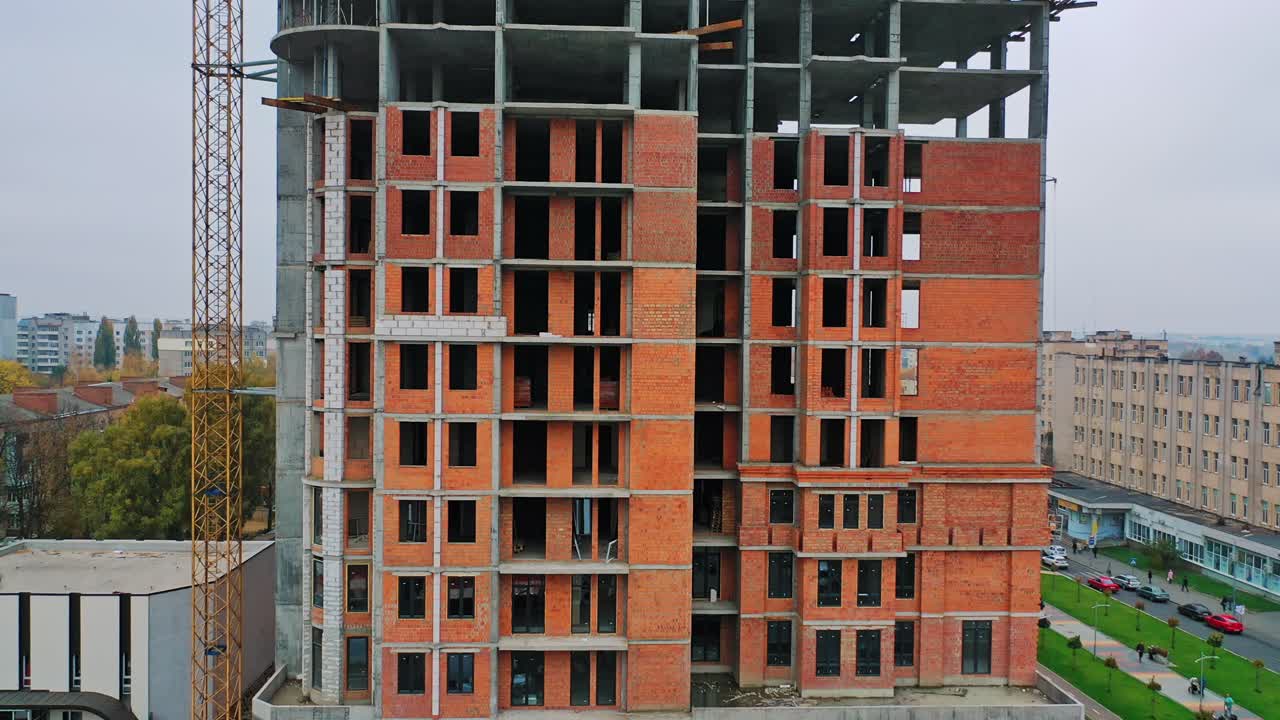 Construction of a residential apartment complex. View from the bottom to the top.