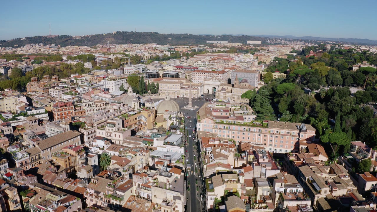Aerial View of Rome Cityscape with Historic Architecture, Busy Avenue and Dense Rooftops. Drone View of the Italian Capital on Sunny Day. UNESCO World Heritage Site with Renaissance Charm.