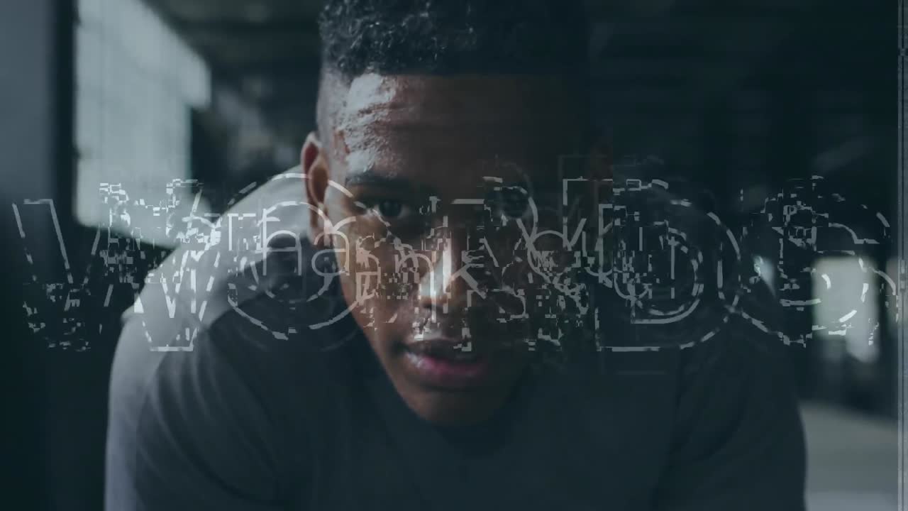 gracias texto en estilo grunge contra el primer plano de un hombre afroamericano en el gimnasio