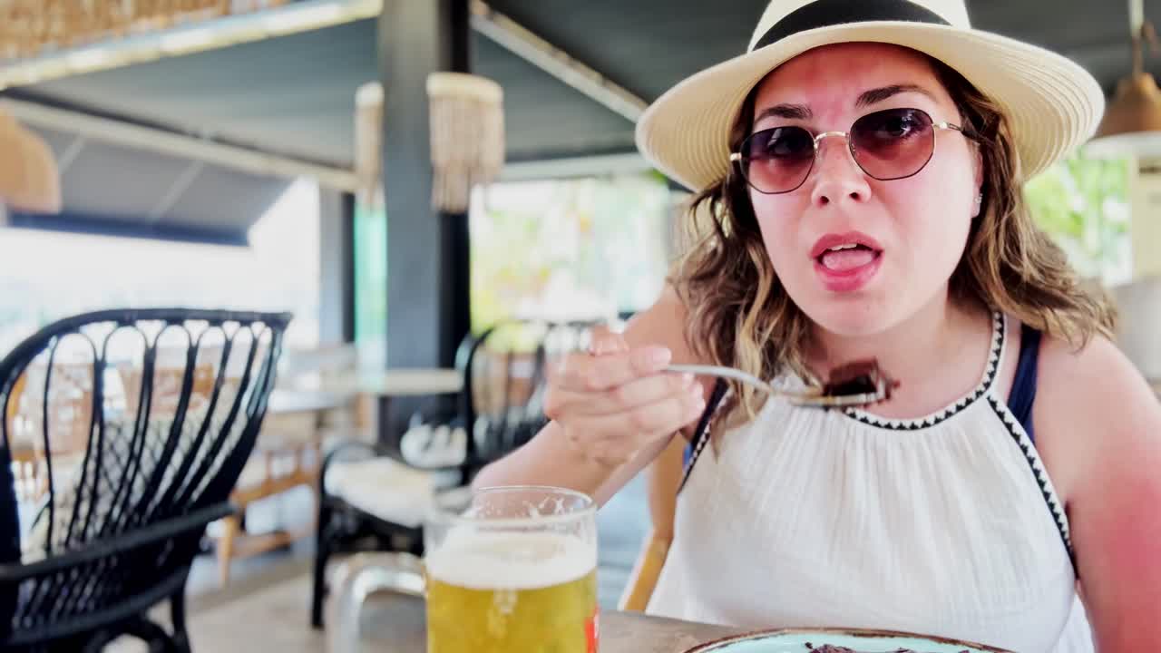 Culinary Travel: Young Woman Vlogging Her Greek Meal