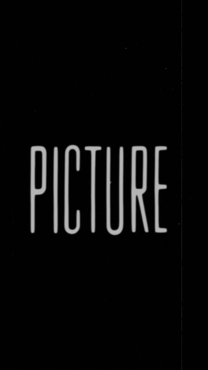 Video verticale di un leader di pellicola analogica vintage danneggiato con la parola "picture"