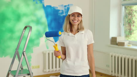 woman painting a wall