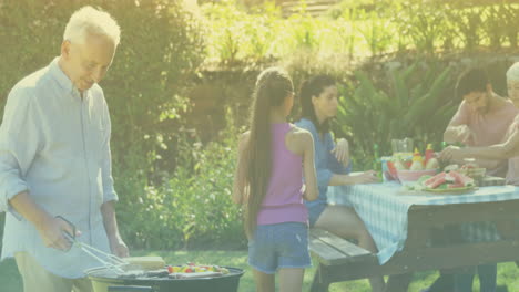 animation of smiling caucasian family having barbecue