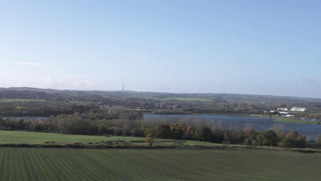 west yorkshire landscape with lake wide establishing panning shot