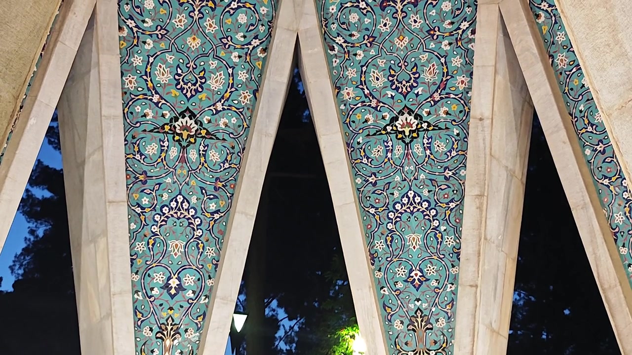 Intricate Persian Tilework on Architectural Structure at Night