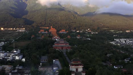 beautiful buddhist temple on dali mt cangshan foothills, china, aerial