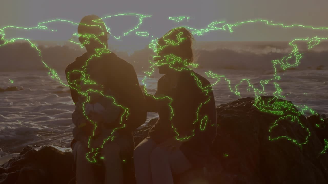 Parents holding baby on rocks, watching sunset while neon travel map overlay appearing over family
