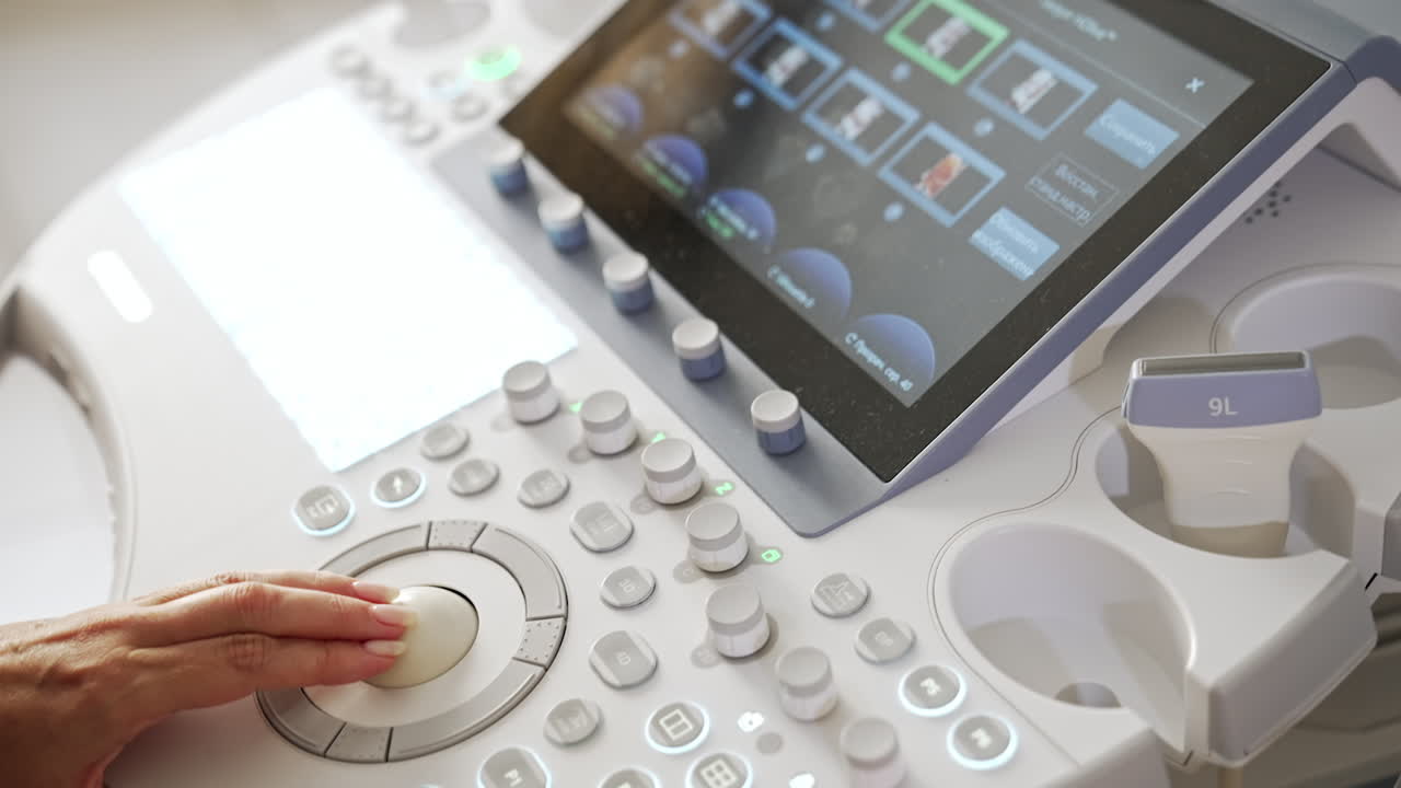 Woman operating an ultrasound machine