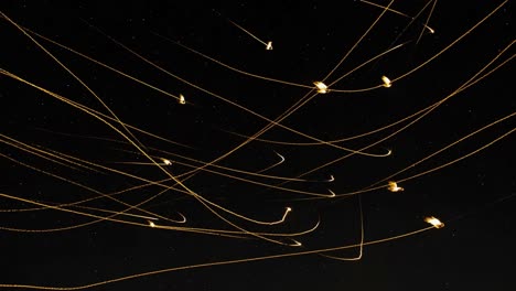 Captivating Night Sky Trails: An Artistic Display of Celestial Light Paths and Illumination Patterns Captured in Stunning Detail