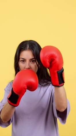 woman training with red boxing gloves