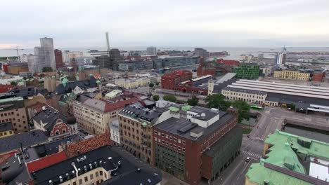 aerial shot of church in malmö city in sweden. drone flying over church building and cityscape