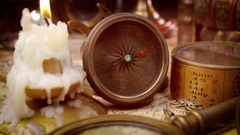 vintage style travel and adventure. vintage old compass and other vintage items on the table.