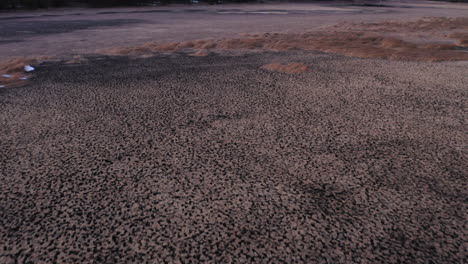 aerial flyover dried out lake after heat