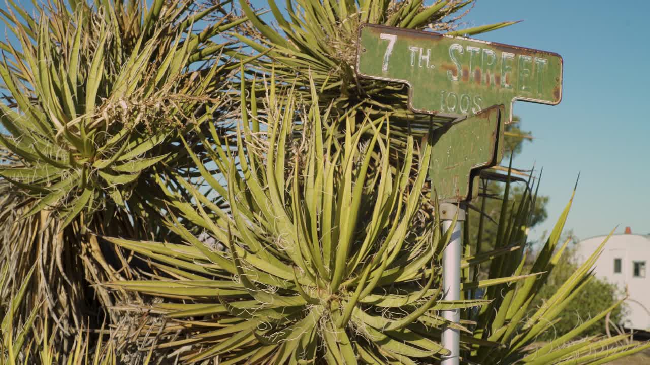Old 7th street road sign again't palm tree and blue sky in the desert
