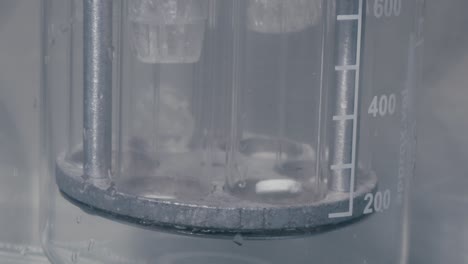 measuring tube while working in medical drug company
