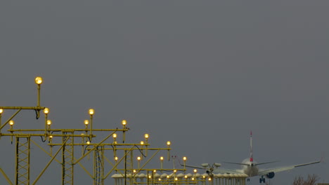 airplane landing on a cloudy day