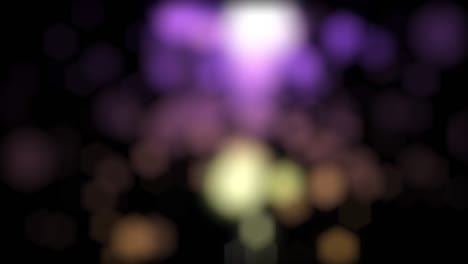abstract fuente de delicioso bokeh y partículas que vuelan hacia arriba y caen hacia abajo en fondo negro, bucle sin costuras. animación. hermosos destellos borrosos, fuego de bengala