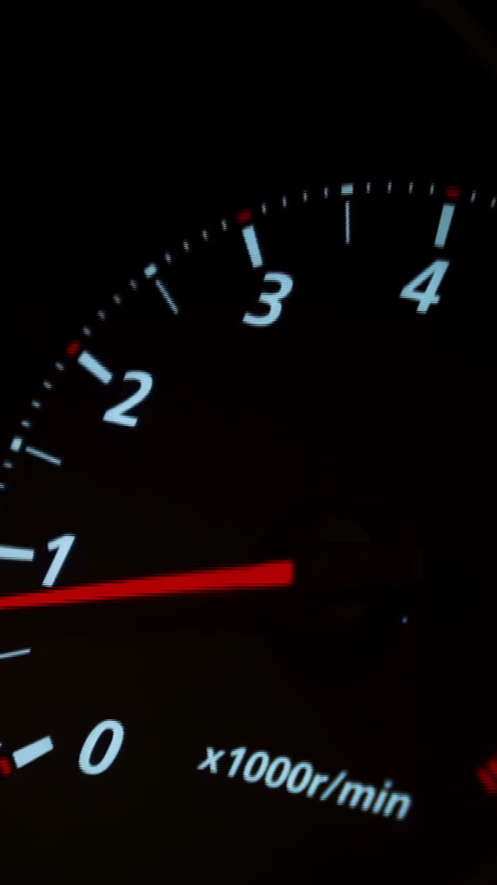 Close-up of a car's tachometer