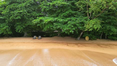 Side-view-low-shot-in-front-of-a-beach-in-Prince-Island,-São-Tomé,-Africa