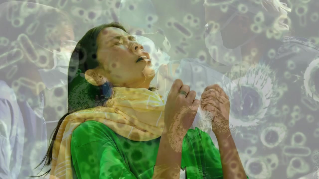 Woman Sneezing into Tissue with Virus Overlay