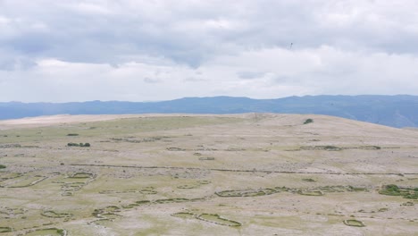 Aerial-flyover-shot-of-the-Moon-Plateau-in-Baska-on-Krk-Island,-Croatia