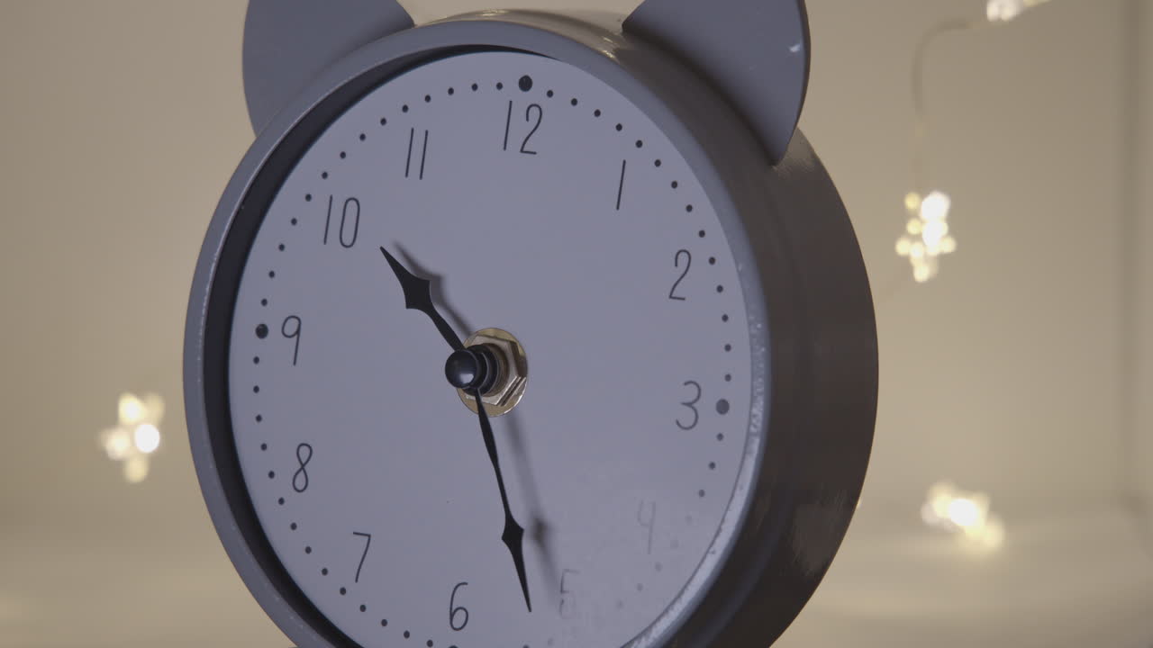 Time lapse. Close up white analog clock