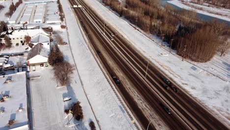 aerial perspective of the busy deerfoot highway in calgary during winter