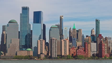 the panoramic vista of manhattan towering skyscrapers from the new jersey side