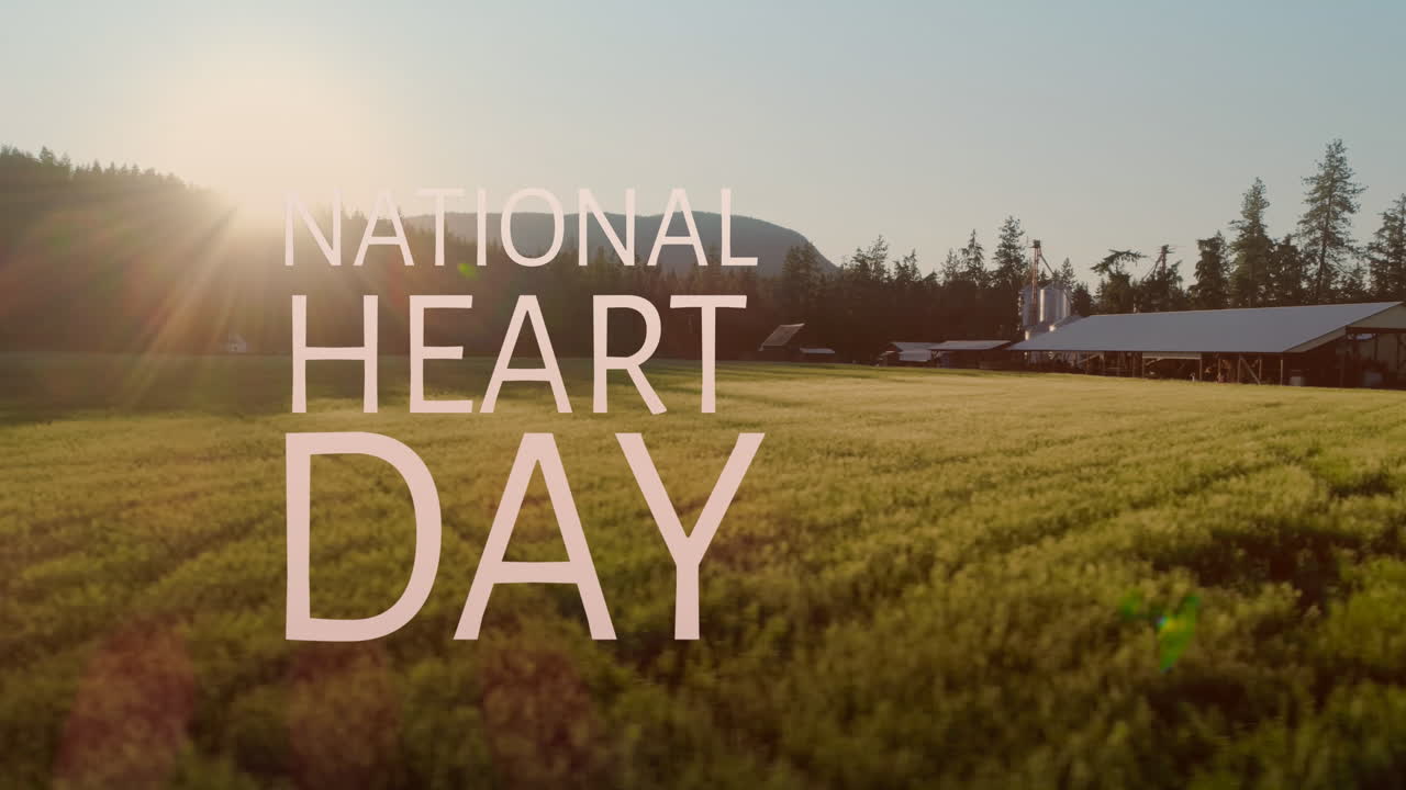Animation of national heart day text over landscape