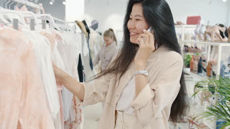 woman shopping for clothes in a fashion store