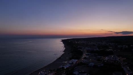 breathtaking 4k aerial sunset over the sea, with vibrant colors painting the sky and water