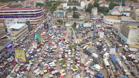 crowd of people and cars at accra central market _1